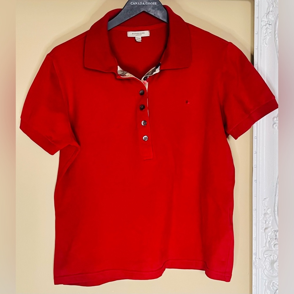 Burberry Maroon Polo Shirt
6 button down shirt Size XL
Made in Poland